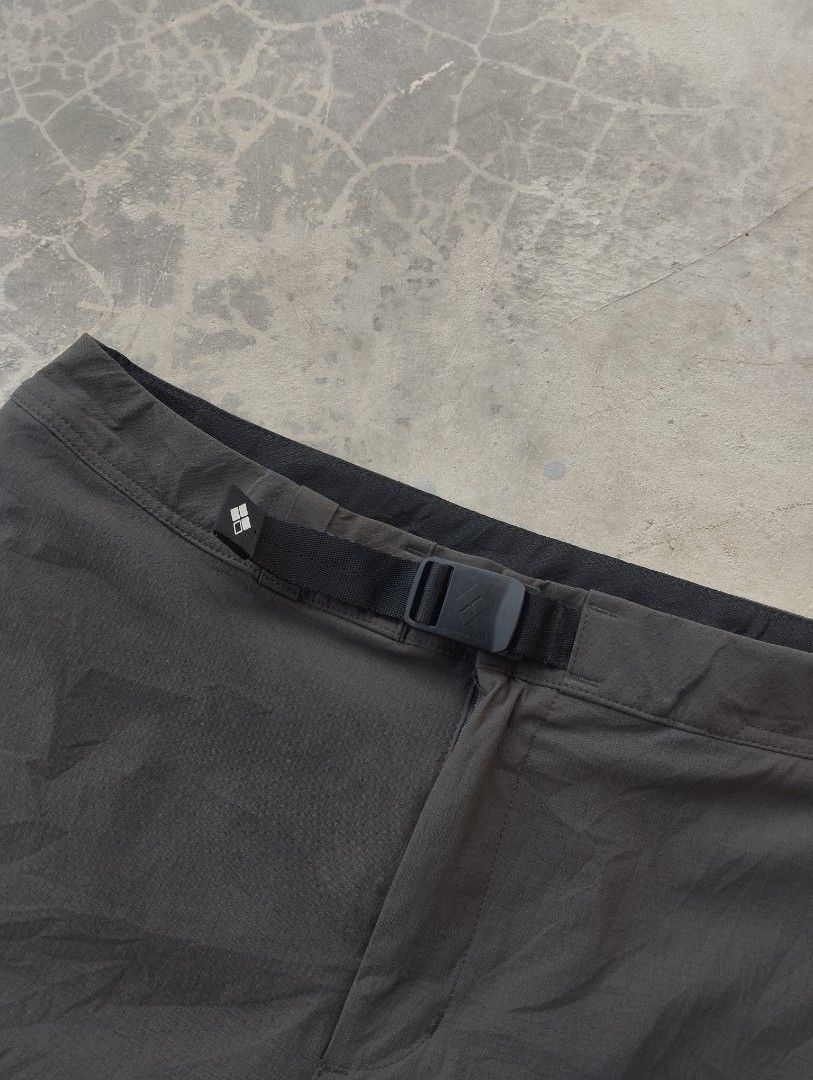 Montbell Hiking Pants M-S Grey (Category: Trousers) located in Mati. Submitted by old_era.ph (Listing ID 1463788393, Image 3). Description: - Montbell Hiking Pants - Color: Grey - Size: M-S - Features: Built-in belt, zippered pockets, elasticated waist with drawstring - Material: Lightweight and durable - Ideal for: Outdoor activities, trekking, casual wear - Branding: Montbell logo on the back.