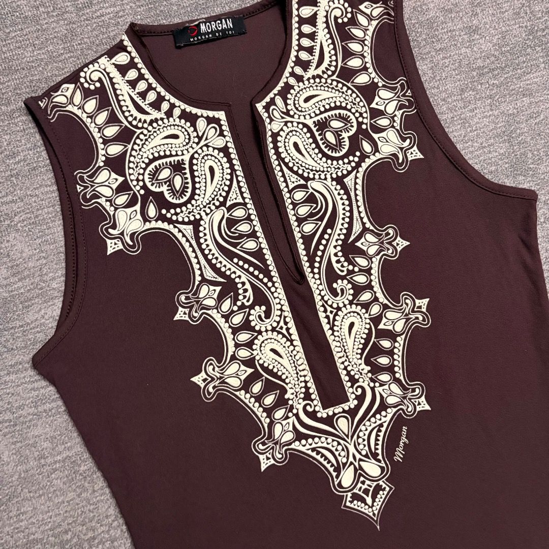 Morgan de toi brown stretch top (Category: Sleeveless) located in Calamba. Submitted by bermuda.ph (Listing ID 1463884173, Image 2). Description: Featuring a deep neckline with contrasting creamed-colored paisley and ornate scrollwork embroidery, labeled with the brand Morgan. .