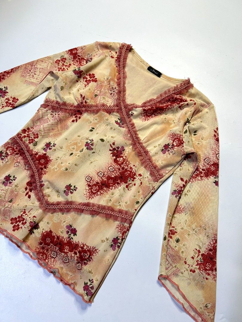 MOST BEAUTIFUL! Oriental Top with Ruffle Trim (Category: Longsleeves) located in Marikina City. Submitted by wearablearttt (Listing ID 1463930448, Image 2). Description: -has lining -not see through mesh 𖨆 LAID FLAT MEASUREMENTS ‎L 20" ‎W 12-14" ‎B 13.5-16".