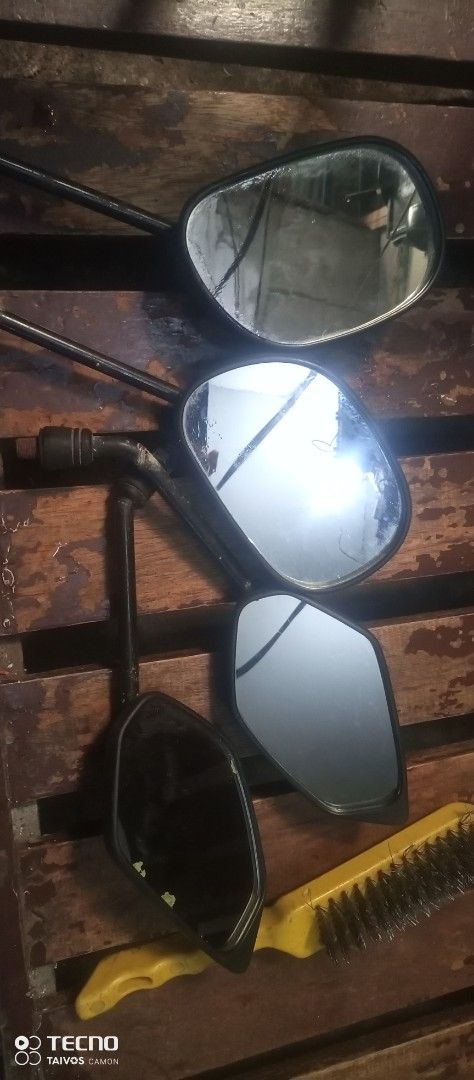 Motorcycle Side Mirrors Set (Category: Mirrors) located in Manila. Submitted by abumusamus (Listing ID 1463747262, Image 2). Description: - Set of motorcycle side mirrors - Color: Black with metal stems - Glass: Clear - Condition: Minor scuffs on frame s - Sold as a lot from sniper MX motor pwede din yata ito sa MGA other motor 300 lahat na.
