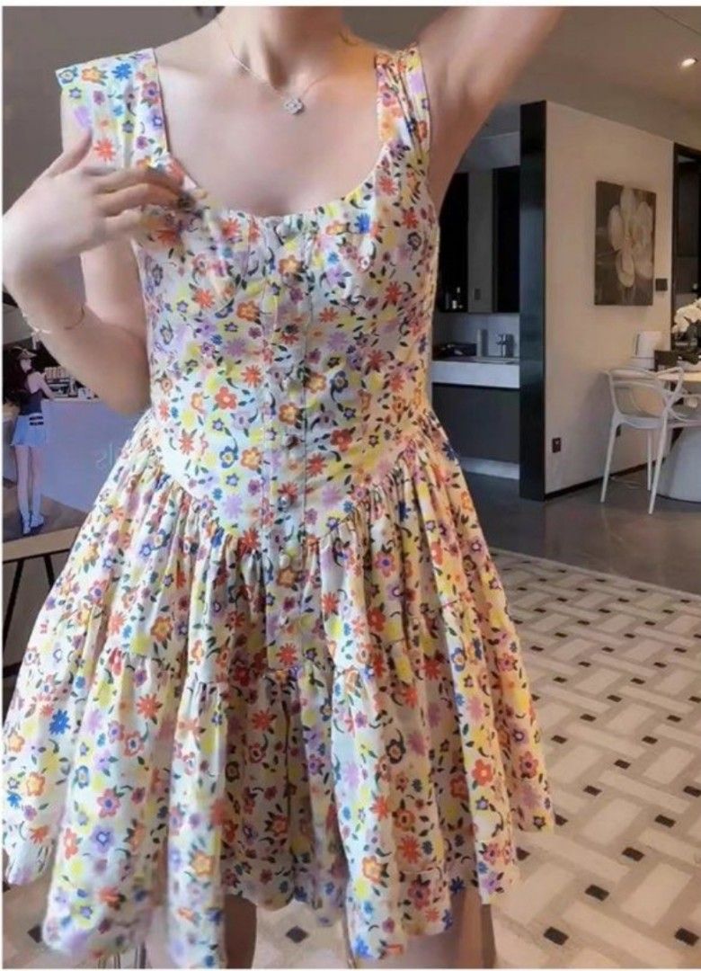 Multicolored floral buttondown romper dress (Category: Rompers) located in Batangas. Submitted by micaelaul (Listing ID 1457607620, Image 1). Description: 30-32 bust 24-26 waist non-stretch super ganda at rare nito, no ww lang kasi semi large frame po ako.