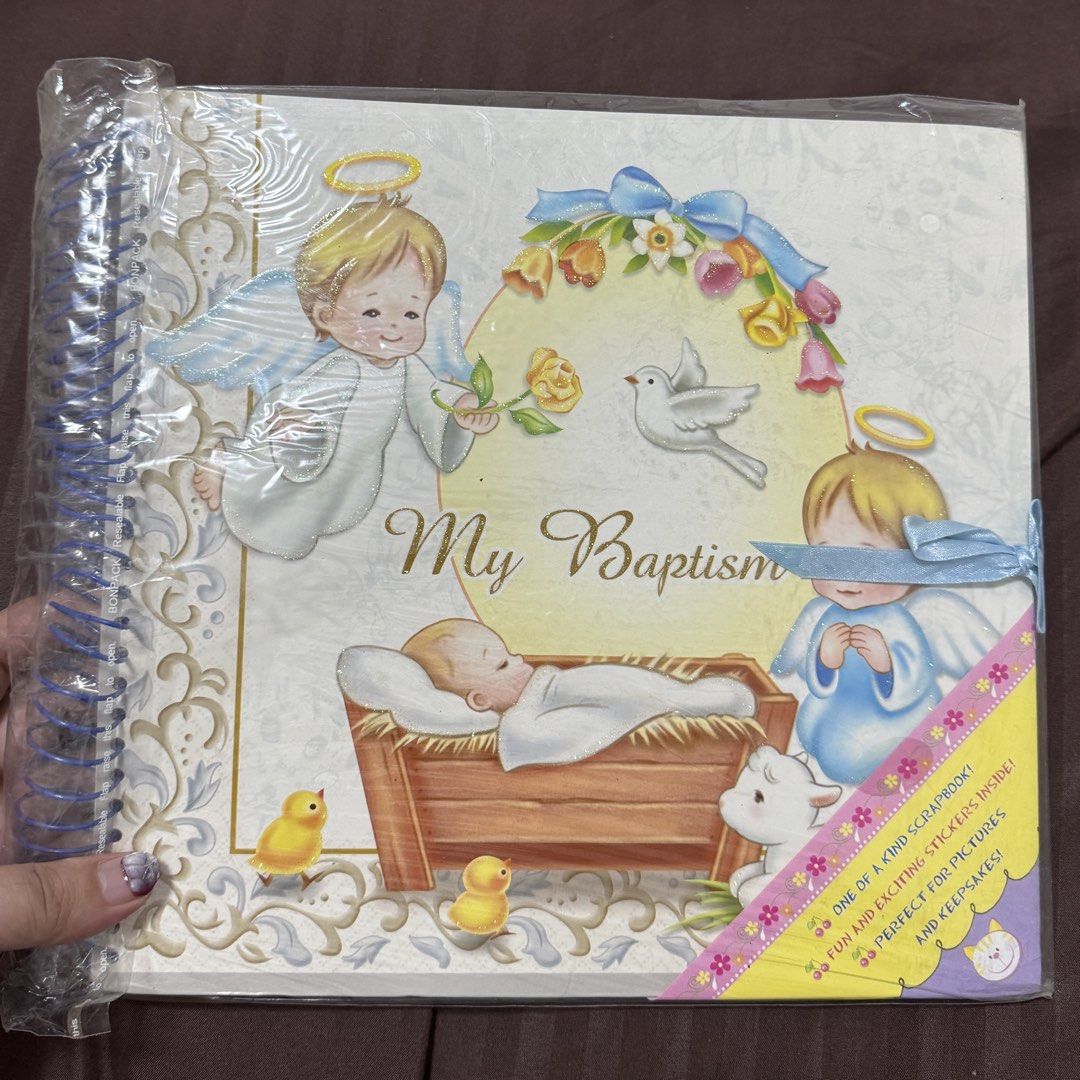 My Baptism Scrapbook with Stickers (Category: Stationery & School Supplies) located in Muntinlupa City. Submitted by readthedetails (Listing ID 1463858730, Image 1). Description: - Cute 'My Baptism' scrapbook - Includes fun and exciting stickers - Perfect for preserving photos and memories - Spiral bound for easy page turning - Ready to capture your special moments.