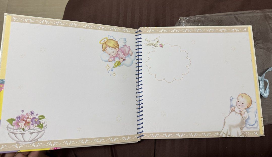 My Baptism Scrapbook with Stickers (Category: Stationery & School Supplies) located in Muntinlupa City. Submitted by readthedetails (Listing ID 1463858730, Image 2). Description: - Cute 'My Baptism' scrapbook - Includes fun and exciting stickers - Perfect for preserving photos and memories - Spiral bound for easy page turning - Ready to capture your special moments.