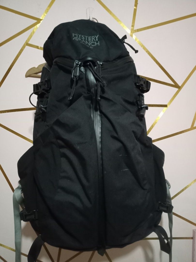 Mystery Ranch Coulee 40 Backpack Black (Category: Backpacks) located in General Santos City (Dadiangas). Submitted by loloikoh63127 (Listing ID 1463831604, Image 1). Description: - Mystery Ranch Coulee 40 backpack - Color: Black - Ideal for hiking and travel - Multiple pockets for organization - Numerous straps for securing gear - Smooth-working zippers - Adjustable straps for a comfortable fit - Ready for your next adventure.