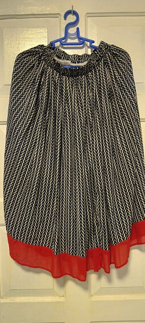Navy and White Patterned Dress with Red Hem (Category: Dresses) located in Paranaque City. Submitted by yesyesyo (Listing ID 1463827406, Image 2). Description: - Navy and white patterned dress - Gathered neckline - Puff sleeves - Sheer red chiffon hem layer - Flowy fit - Versatile for casual or dressed-up looks this is not thrifted. all are for personal decluttering only. payment thru Gcash delivery options: J&T and Lalamove. please check my othe