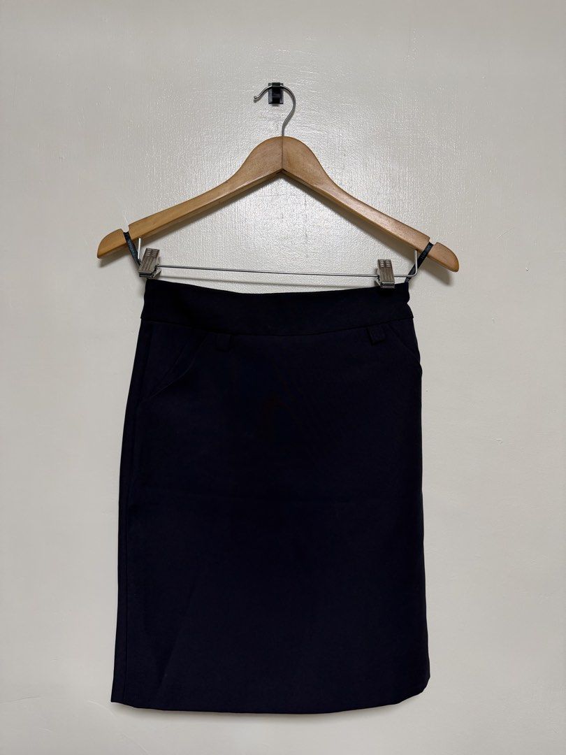 Navy Blue Pencil Skirt (Category: Skirts) located in Manila. Submitted by don_p (Listing ID 1463863279, Image 1). Description: XS - Classic navy blue pencil skirt - Knee-length cut - Functional front pockets - Zipper closure at the back - Versatile for work or casual wear - Easy to pair with blouses and tops.
