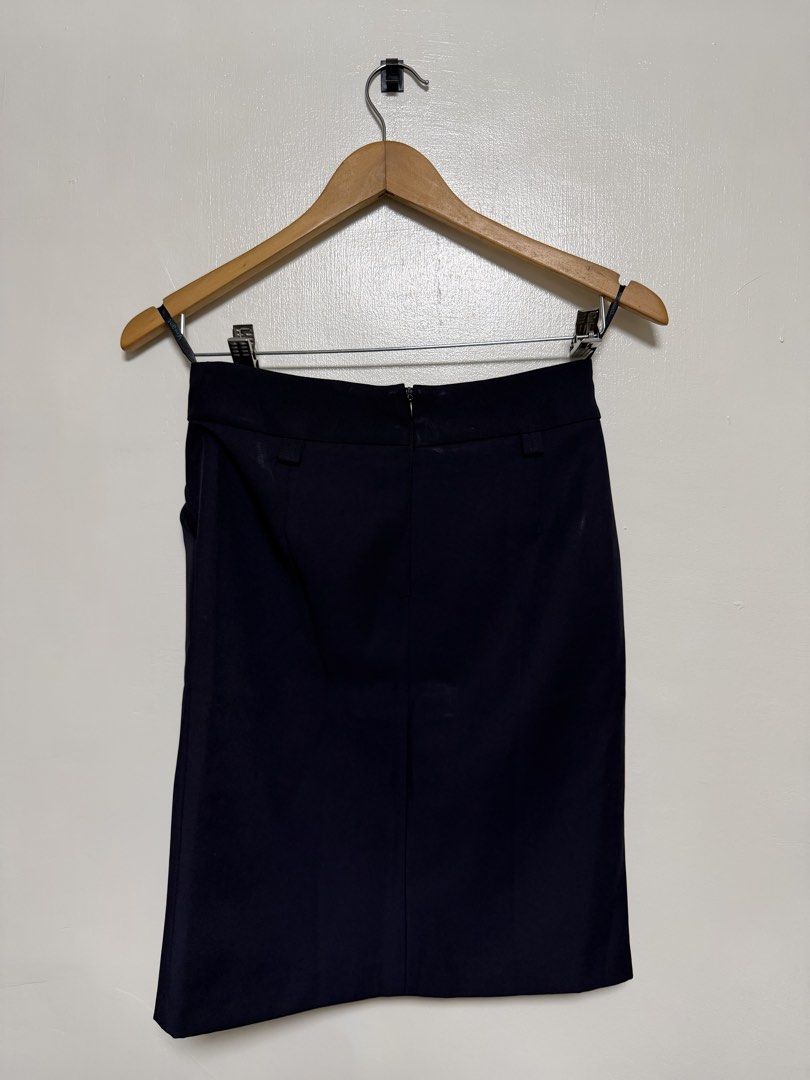 Navy Blue Pencil Skirt (Category: Skirts) located in Manila. Submitted by don_p (Listing ID 1463863279, Image 2). Description: XS - Classic navy blue pencil skirt - Knee-length cut - Functional front pockets - Zipper closure at the back - Versatile for work or casual wear - Easy to pair with blouses and tops.