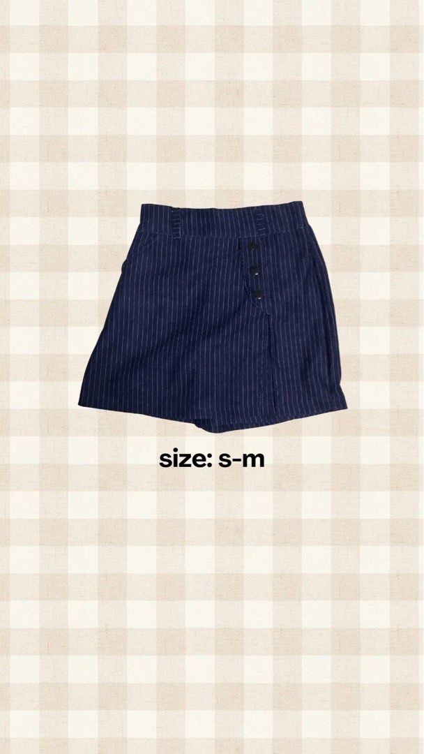 Navy Blue Pinstripe Skort with Button Detail (Category: Skirts) located in Manila. Submitted by mornight736 (Listing ID 1463787278, Image 1). Description: - Cute navy blue skort - White pinstripe pattern - Button detail on the side - Versatile for casual or dressy outfits - Size S-M.