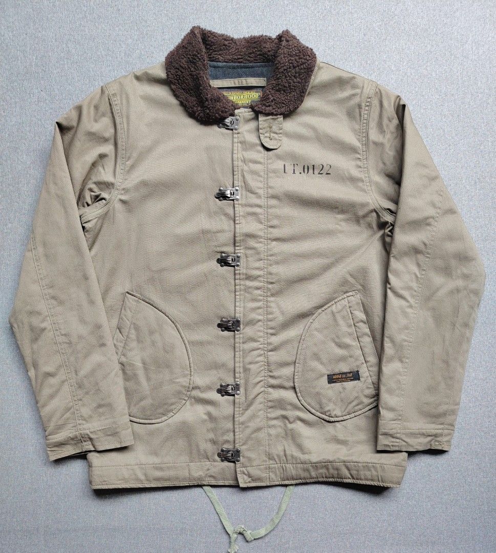 NEIGHBORHOOD N1 Deck Jacket IRON BUTTON (Category: Coats, Jackets and Outerwear) located in Taguig. Submitted by _theroom.ph (Listing ID 1463909912, Image 1). Description: - Brand: NEIGHBORHOOD - Color: Khaki - Size: XL Regular - Features: Sherpa collar, toggl button closure - Details: 'LT.0122' print on chest, two large front pockets, drawstring hem - Accent: Small nbhd.co.ltd tag NEIGHBORHOOD N1 Deck Jacket IRON BUTTON Size XL 29 x 22.5 7500 + 