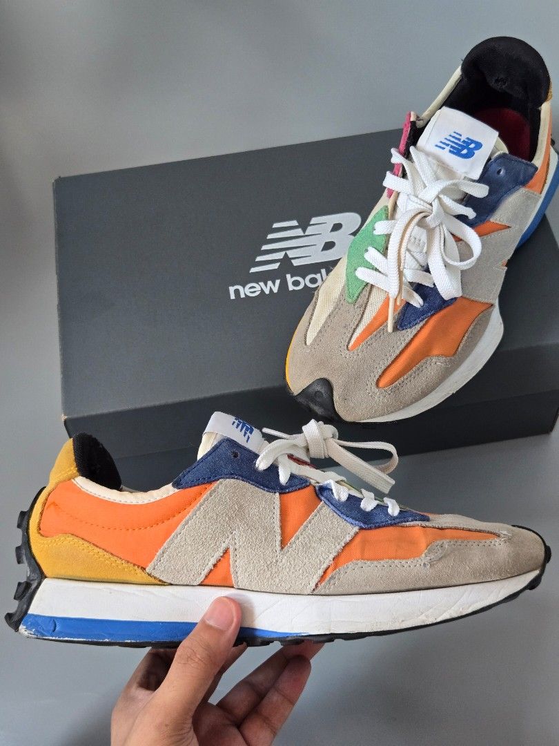 New Balance 327 Sneakers Multi-Color (Category: Sneakers) located in Pasig City. Submitted by anton81300 (Listing ID 1463761815, Image 1). Description: - New Balance 327 sneakers 💯 - Colorway: Grey, orange, blue, and yellow mix - Condition: signs of usage, with minor flaw on stitchings but the soles are intact✅ - see photos for the sole and other parts of the shoe's condition 📢 - White laces - Ideal for casual wear👌 rfs: di na nagagamit (declu