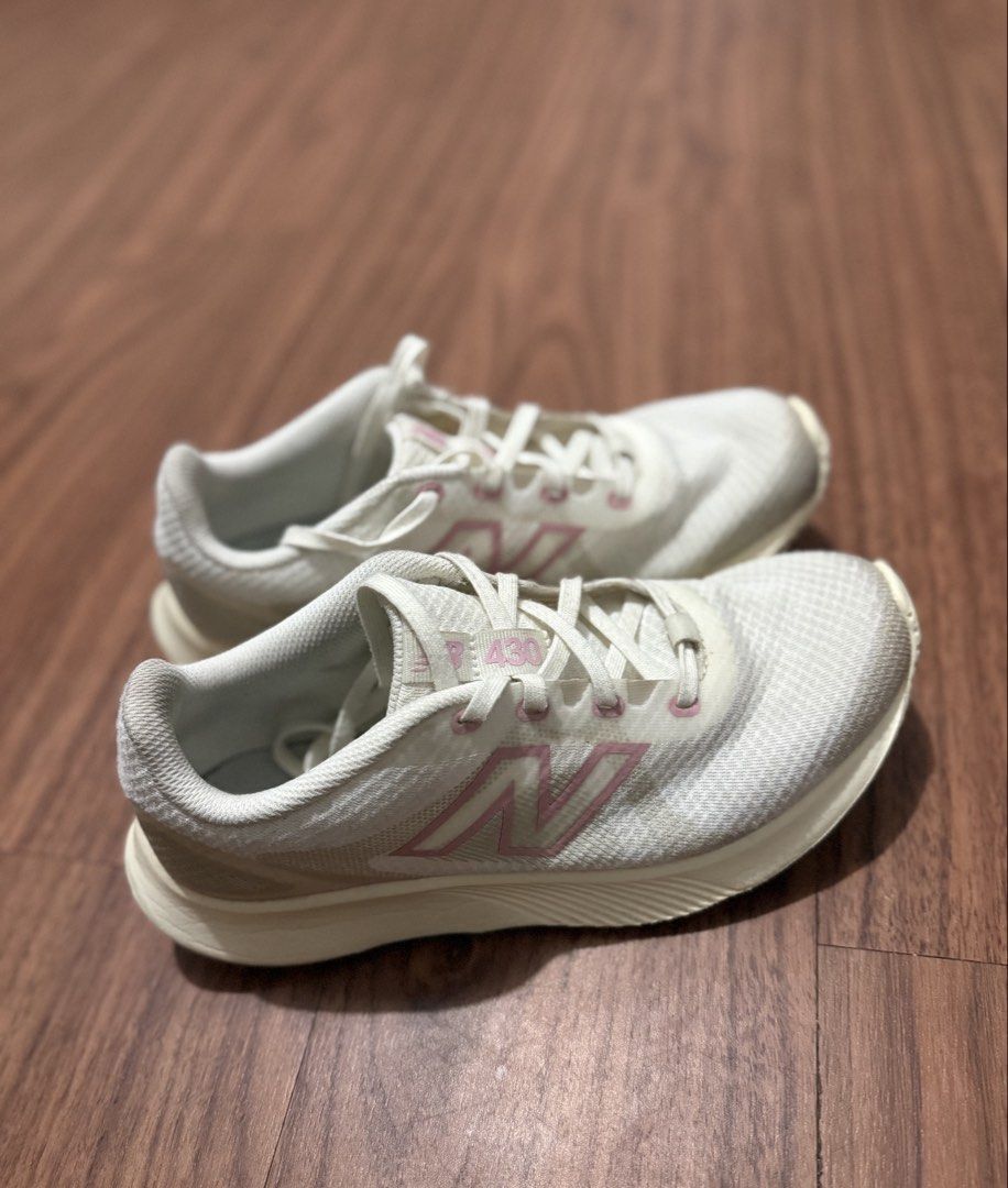 New Balance 430 v4 Ivory (Category: Sneakers) located in Subic. Submitted by shardartn41625 (Listing ID 1463775457, Image 1). Description: - White New Balance 430 running shoes - Pink accent details - Lightweight and breathable mesh upper - Comfortable for everyday wear or light jogs - Minor signs of wear on soles and toe box - Clean laces included - Ready for a new owner.
