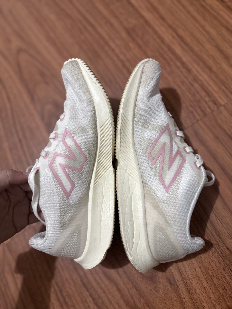 New Balance 430 v4 Ivory (Category: Sneakers) located in Subic. Submitted by shardartn41625 (Listing ID 1463775457, Image 2). Description: - White New Balance 430 running shoes - Pink accent details - Lightweight and breathable mesh upper - Comfortable for everyday wear or light jogs - Minor signs of wear on soles and toe box - Clean laces included - Ready for a new owner.