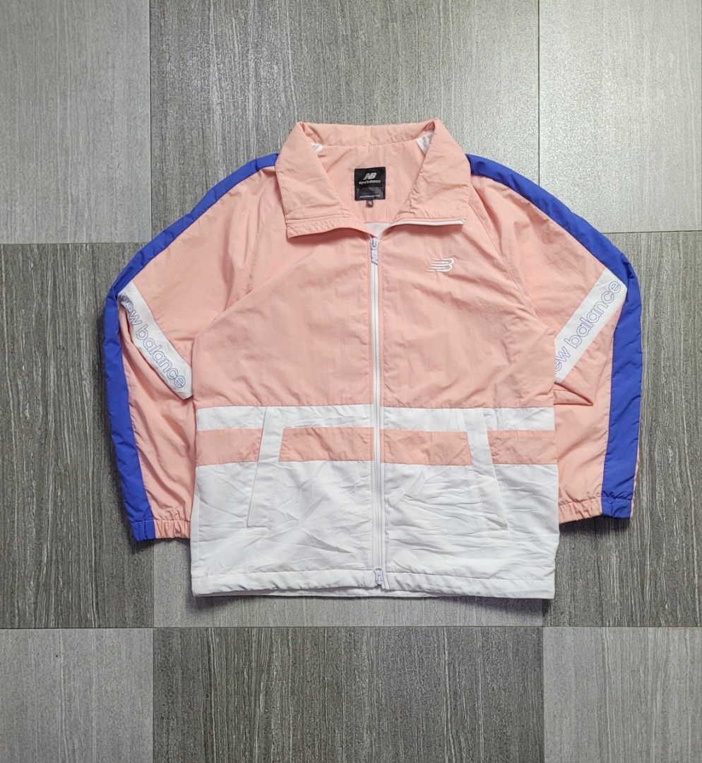 NEW BALANCE COLORBLOCK WINDBREAKER JACKET (Category: Hoodies) located in Manila. Submitted by 7100treasure.co (Listing ID 1463895497, Image 2). Description: NEW BALANCE COLORBLOCK WINDBREAKER JACKET ​• Brand: New Balance • Style: Colorblock Lightweight Windbreaker / Track Jacket • Product Code: NBNM914013 • Color: Pink / White / Blue • Size on Tag: Medium (95 / Asia) • 100% Nylon shell • Breathable mesh interior lining • White embroidered Flying 