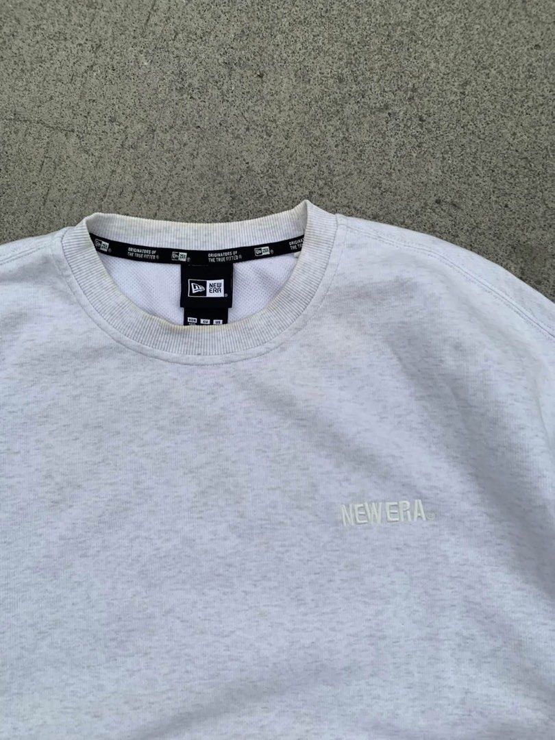 New era crewneck (Category: Coats, Jackets and Outerwear) located in General Santos City (Dadiangas). Submitted by amara_preloved (Listing ID 1463866194, Image 2). Description: New Era Crewneck Size Large Embroid logo Color rate 9.5 Need wash only Mine: 599.