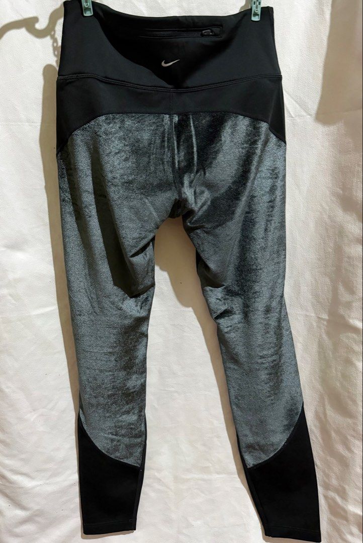 Nike Air Black Leggings (Category: Activewear) located in Paranaque City. Submitted by declutternsell.729 (Listing ID 1463773170, Image 3). Description: - Black Nike Air leggings - Grey velour panels on sides and back - Cropped length - Small zip pocket at back waistband - Drawstring waist - Size: Medium (M).