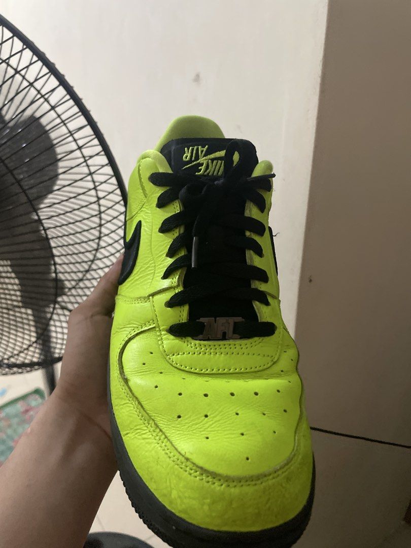Nike Air Force 1 Low Volt Black (Category: Sneakers) located in Marikina City. Submitted by juswashhh (Listing ID 1463927213, Image 2). Description: - Volt yellow Nike Air Force 1s - Black swoosh and sole - Classic Air Force 1 silhouette - Lace-up closure - Shows creasing on toe box and general signs of wear - Ideal for everyday wear.