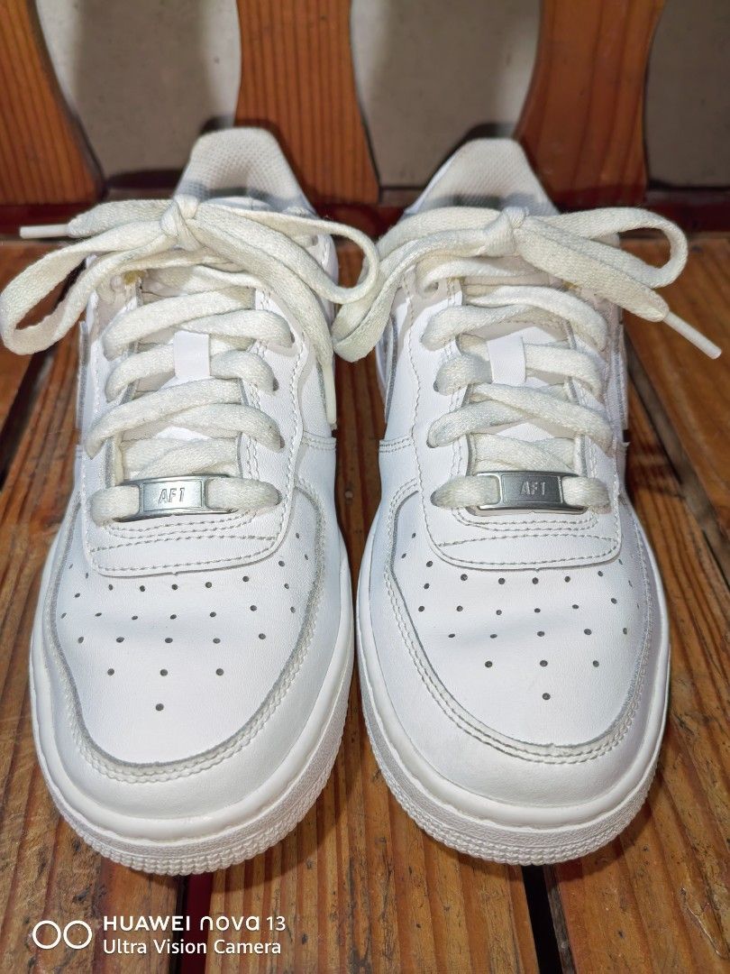 Nike Air Force 1 White Sneakers (Category: Sneakers) located in Cebu City. Submitted by abellarces30419 (Listing ID 1463801407, Image 1). Description: - Classic white Nike Air Force 1s - Low-top design - Perforated toe box for breathability - Iconic Nike Air cushioning - Staple for any sneaker collection - Great for everyday wear - Selling as no longer needed.