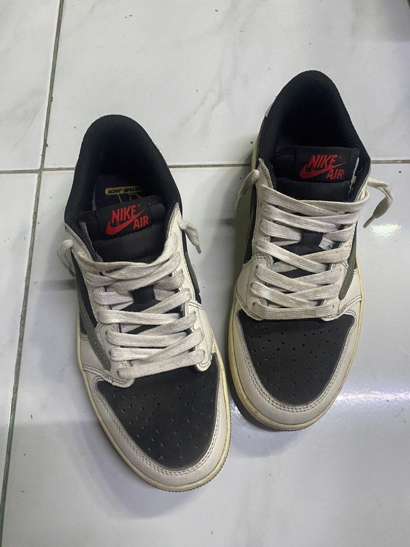 Nike Air Jordan 1 Low Travis Scott (Category: Sneakers) located in Cavite. Submitted by zyrahramos (Listing ID 1463912220, Image 2). Description: 👟 UA Nike Air Jordan 1 Low Travis Scott 👟Size: US Men's 8.5 👟Colorway: Distinctive black, white, and olive green accents 👟Perfect addition to any sneaker collection!.