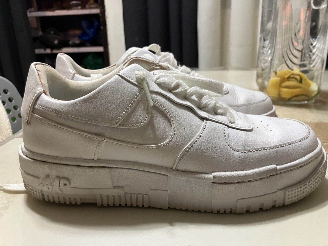 Nike AirForce1 Pixel (Category: Sneakers) located in Calamba. Submitted by chy.salvatore (Listing ID 1463918316, Image 1). Description: authentic Women's Nike Air Force 1 Pixel in the classic Triple White colorway. Size: US 8 Wmns / UK 5.5 / EUR 39 / 25 CM Condition: 8/10 — Normal signs of wear. There is visible creasing on the leather toe box. SKU/Model Code: CK6649-100 Inclusions: No Box. Shoes Only Calamba, Laguna Delivery: Meetups nearby or s