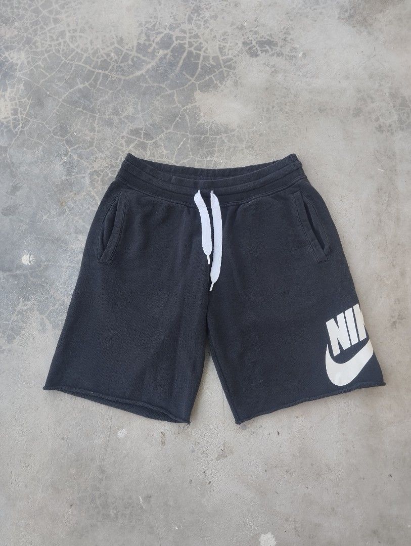Nike Black Sweat Shorts Size M (Category: Shorts) located in Mati. Submitted by old_era.ph (Listing ID 1463789462, Image 2). Description: - Black Nike sweat shorts - Size: Medium - Features classic Nike logo on leg - Adjustable drawstring waist - Raw hem detail - Made in Malaysia - Ideal for casual wear or lounging.