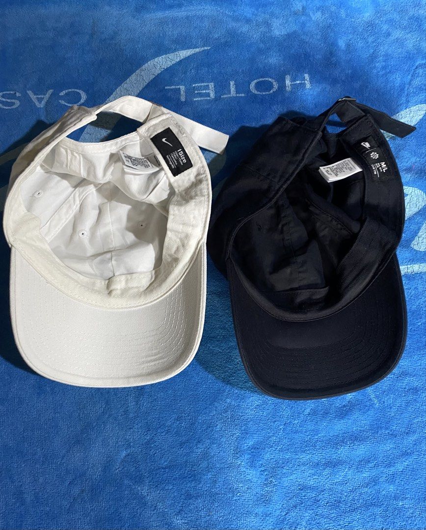 Nike Cap Bundle - Black and White (Category: Caps & Hats) located in Cebu City. Submitted by monflor (Listing ID 1463820181, Image 3). Description: - Set of 2 Nike Caps: 1 Black, 1 White - Classic embroidered Nike logo on front - Adjustable strap for a comfortable fit - Versatile for daily wear or sports activities - Essential accessory duo Good condition No issues 700 each price .