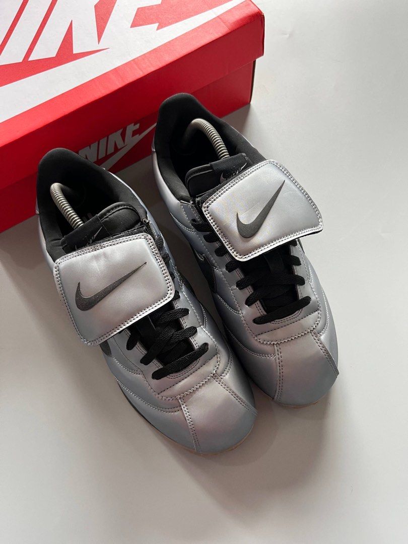 NIKE CORTEZ SE TIEMPO PACK (10.5US) (Category: Sneakers) located in Baguio. Submitted by grabUrPairs (Listing ID 1463833921, Image 2). Description: - Authentic Nike Cortez '72 sneakers - Striking metallic silver and black colorway - Iconic Cortez silhouette - Convenient velcro strap closure - '72' detail prominently displayed on the heel - Comes with the original Nike box.