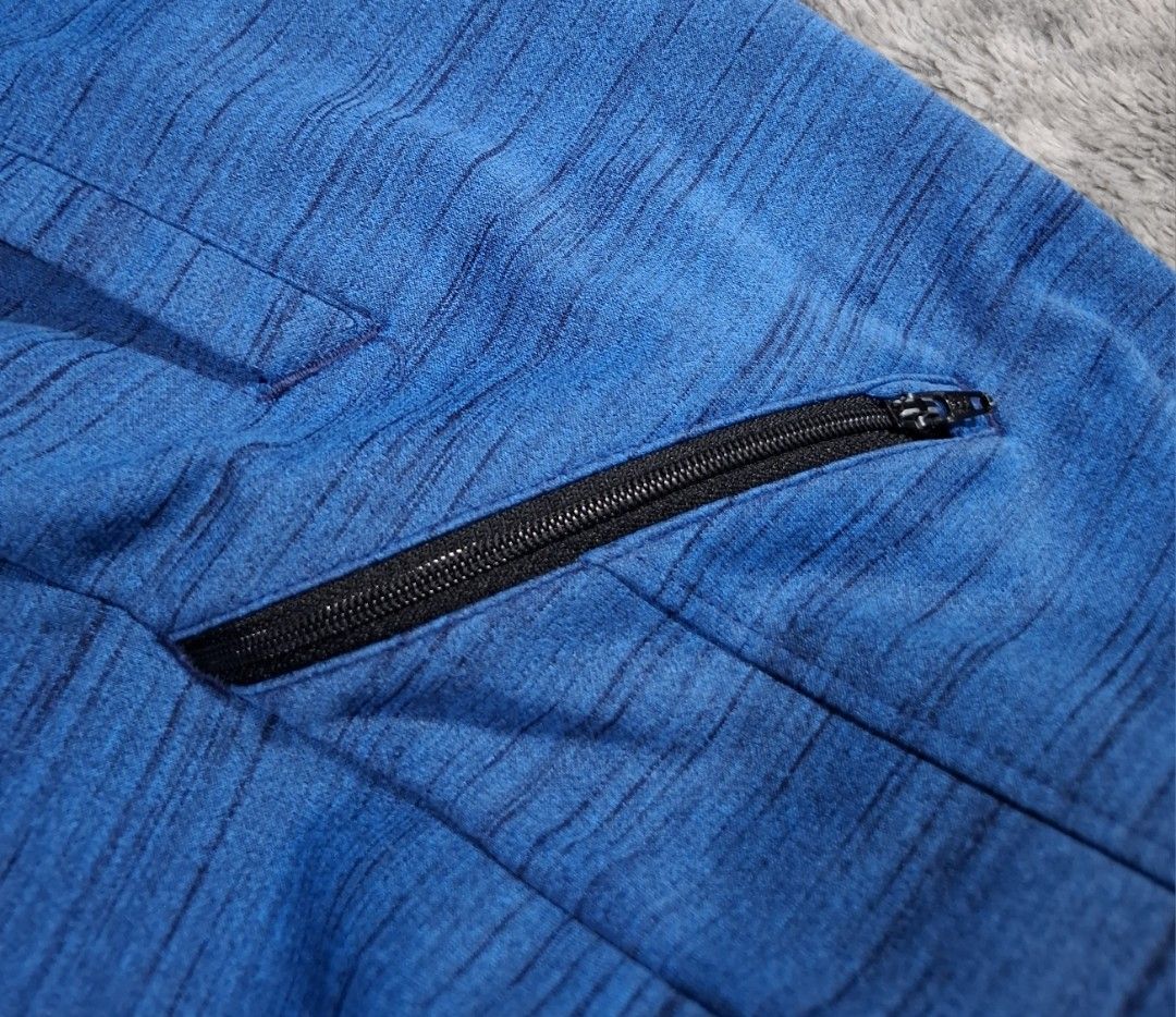 Nike Dri-Fit Blue Jogger Pants Size M (Category: Joggers) located in Sorsogon. Submitted by johnmichae69459 (Listing ID 1463869608, Image 3). Description: - Blue Nike Dri-Fit Jogger Pants - Size: Medium (M) - 30 to 34 waistline - 38 lenght - Made in China - Zippered side pocket for secure storage - Elastic waistband with adjustable drawstring - Black accents on lower legs - Ideal for workouts and casual wear.