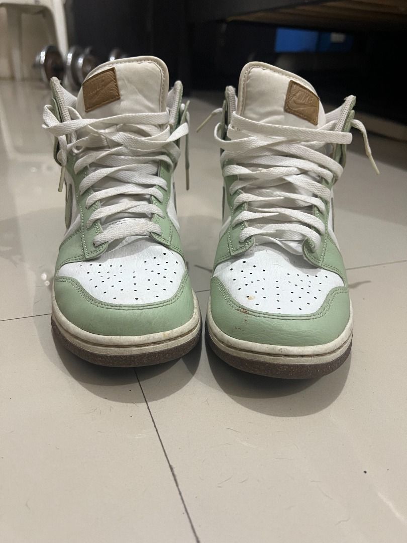 Nike Dunk High Light Green (Category: Sneakers) located in Manila. Submitted by antwoneong (Listing ID 1463818426, Image 3). Description: - Nike Dunk Highs White and Light Green - Bought in South Korea a few years back - Lightly used. I have not used it in a while - Good condition and color - Minimal signs of use, with slight wear due to age. - Classic high-top silhouette .