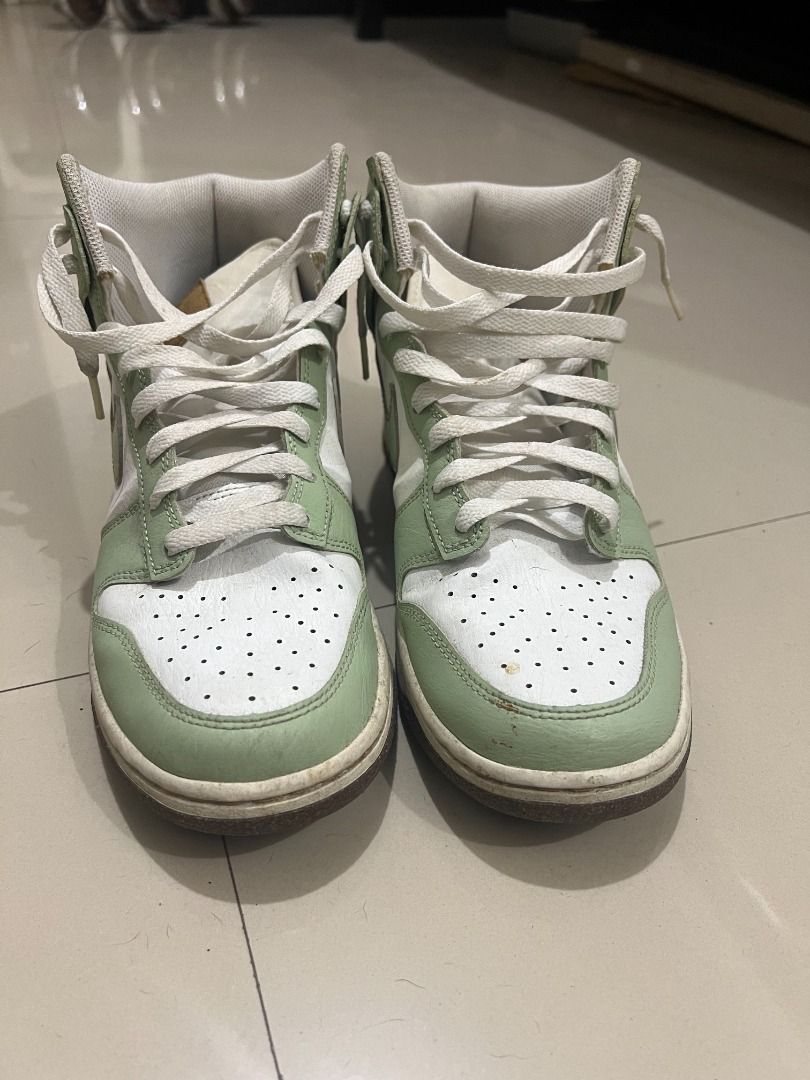 Nike Dunk High Light Green (Category: Sneakers) located in Manila. Submitted by antwoneong (Listing ID 1463818426, Image 2). Description: - Nike Dunk Highs White and Light Green - Bought in South Korea a few years back - Lightly used. I have not used it in a while - Good condition and color - Minimal signs of use, with slight wear due to age. - Classic high-top silhouette .