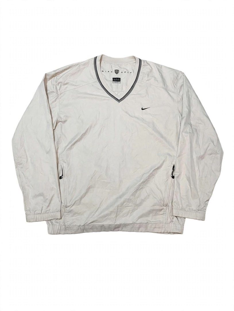 Nike Golf Pullover V-Neck Long Sleeve Top (Category: Longsleeves) located in Santa Maria. Submitted by lftgcollective (Listing ID 1463910888, Image 1). Description: - White Nike Golf Pullover - V-neck design with quarter zip - Nike Swoosh logo on chest - Dri-FIT technology for dryness - Elasticated cuffs and hem - Ideal for golf or casual wear.