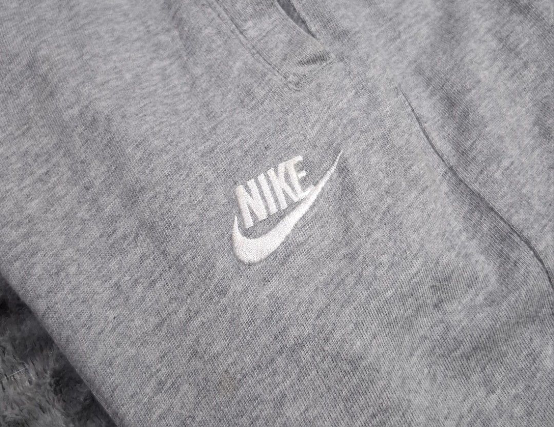 Nike Grey Cotton Sweatpants Joggers Size S (Category: Joggers) located in Sorsogon. Submitted by johnmichae69459 (Listing ID 1463870721, Image 2). Description: - Grey Nike sweatpants - Made from 100% cotton - Small - 28 to 32 waistline - 27 lenght - Classic Nike logo embroidered on left leg - Elastic waistband with drawstring for a secure fit - Ribbed cuffs for a snug feel - Ideal for lounging, casual wear, or workouts.