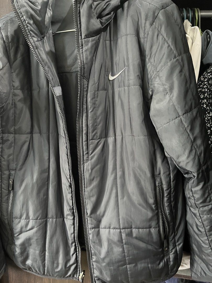 Nike Men's Reversible Hooded Black Jacket (Category: Coats, Jackets and Outerwear) located in Quezon City. Submitted by nikkadg (Listing ID 1463778161, Image 3). Description: - Black Nike reversible jacket - hoodie removal - Quilted design on one side, smooth on the other - Full zip closure - Features pockets - Ideal for layering - Suitable for casual wear or light outdoor activities - laid flat dimensions: 21” width 26” length 25” arm/sleeve len
