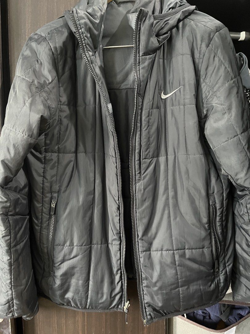 Nike Men's Reversible Hooded Black Jacket (Category: Coats, Jackets and Outerwear) located in Quezon City. Submitted by nikkadg (Listing ID 1463778161, Image 2). Description: - Black Nike reversible jacket - hoodie removal - Quilted design on one side, smooth on the other - Full zip closure - Features pockets - Ideal for layering - Suitable for casual wear or light outdoor activities - laid flat dimensions: 21” width 26” length 25” arm/sleeve len
