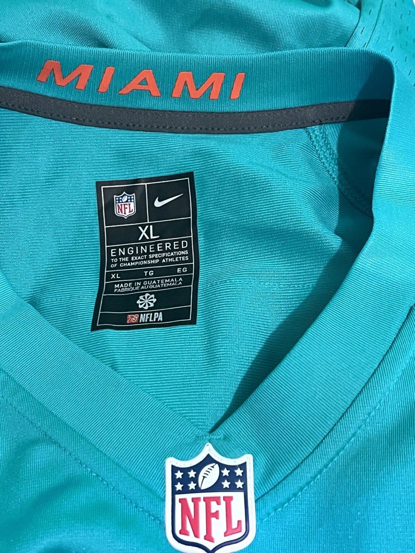 Nike Miami Dolphins NFL Jersey XL (Category: Activewear) located in Manila. Submitted by cleverstone_21f597 (Listing ID 1463795841, Image 2). Description: - Miami Dolphins Jersey - Size: XL - Features number 5 - Brand: Nike - NFL Official - Made in Guatemala - Ideal for any Dolphins fan!.