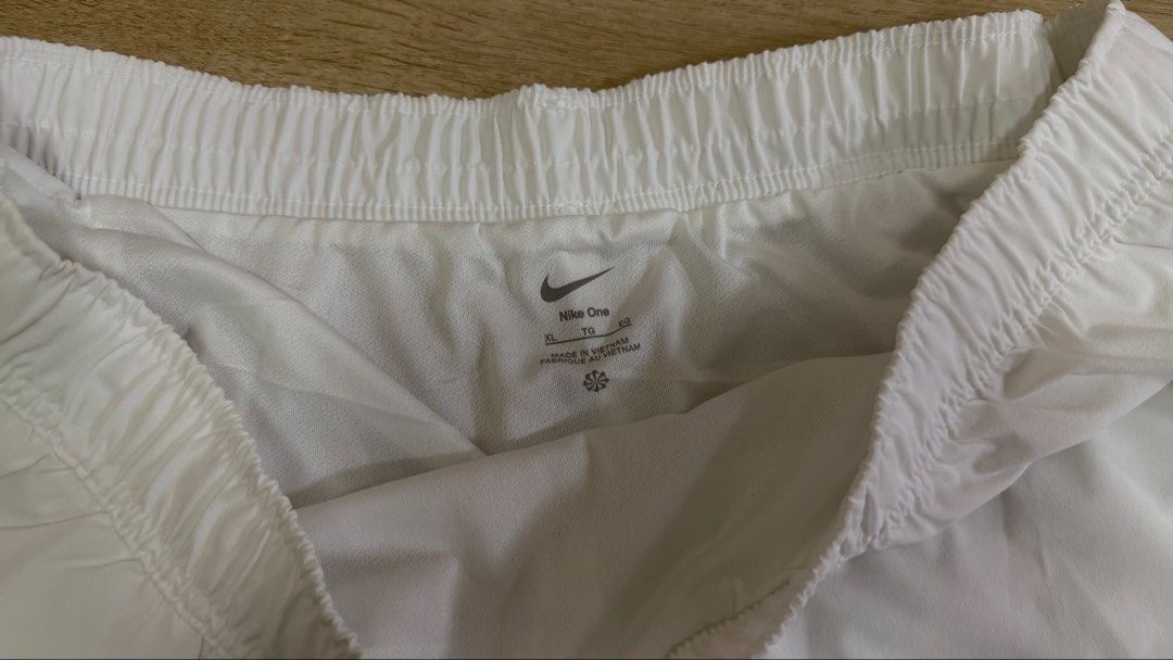 Nike One White Running Shorts (Category: Shorts) located in Taguig. Submitted by beanutputter00 (Listing ID 1463835983, Image 2). Description: - Brand: Nike - Model: One Running Shorts - Size: XL - Features: Elastic waistband for a comfortable fit - Material: Lightweight, ideal for performance or casual use - Versatile: Suitable for workouts, running, or everyday casual wear RFS: Bought wrong size.