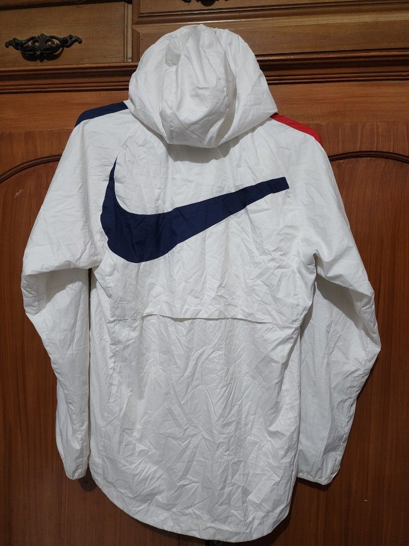 Nike Paris SaintGermain White Windbreaker (Category: Coats, Jackets and Outerwear) located in Tanza. Submitted by coki27 (Listing ID 1463876793, Image 2). Description: - White Nike windbreaker jacket - Features PSG logo - Red and blue accents on sleeves - Large navy swoosh on the back - Full zip front with hood - Size: Small on tag -Selling: 1,000 -Meetup/Pickup: Tanza Cavite -Shipping: LBC/JnT/LALAMOVE (add SF) TY 🫡🙌.