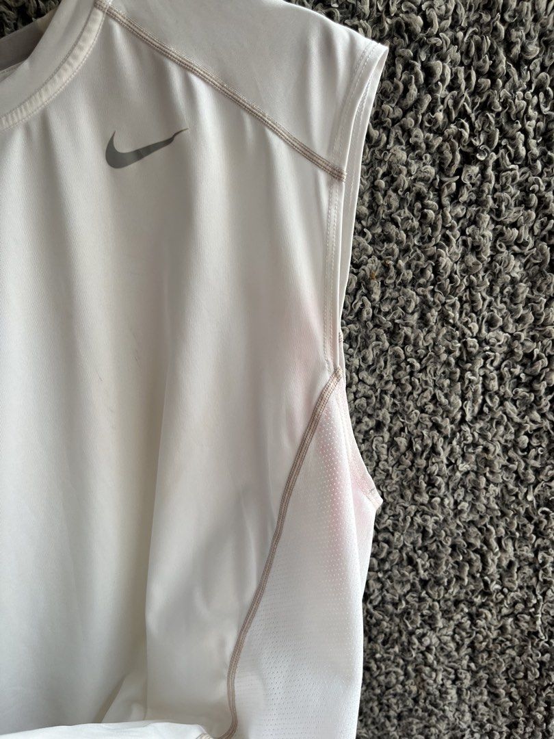 Nike Pro Combat Core Fitted Sleeveless | Size XL (Category: Tshirts & Polo Shirts ) located in General Trias. Submitted by zrchustle.604 (Listing ID 1463873032, Image 3). Description: Nike Pro Combat Core Fitted Sleeveless Top in white. It features Nike's signature moisture-wicking Dri-FIT fabric designed for high-performance athletic training and workouts..
