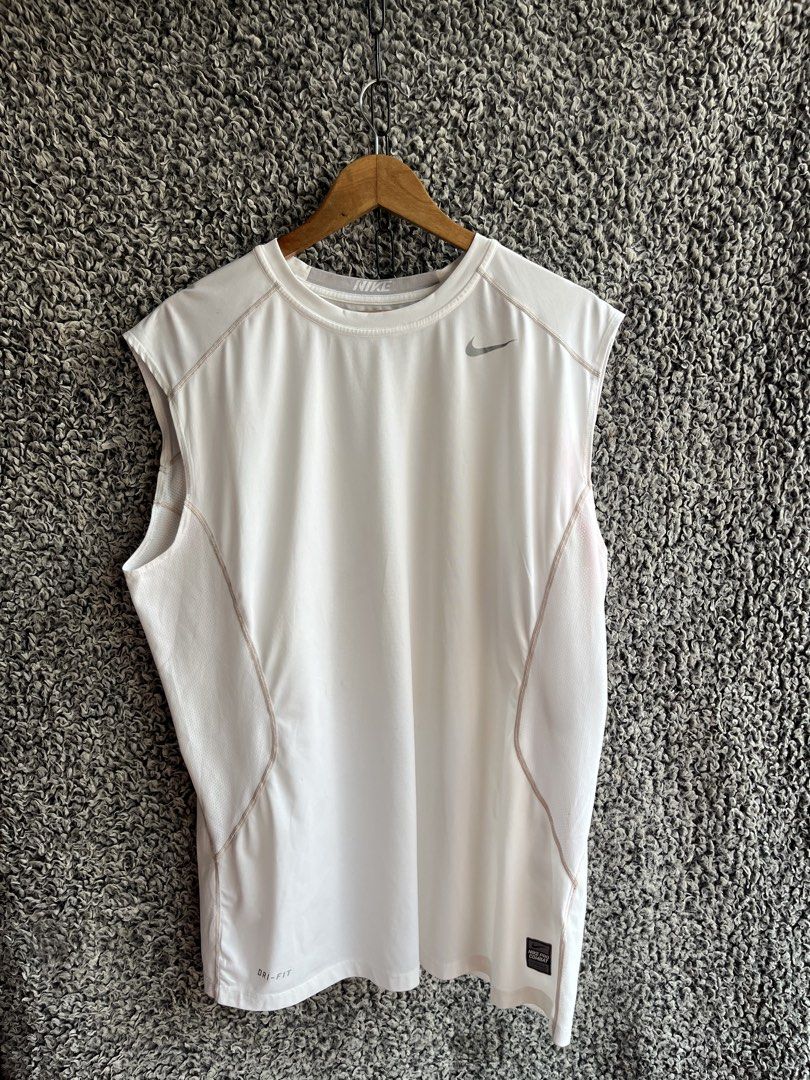 Nike Pro Combat Core Fitted Sleeveless | Size XL (Category: Tshirts & Polo Shirts ) located in General Trias. Submitted by zrchustle.604 (Listing ID 1463873032, Image 1). Description: Nike Pro Combat Core Fitted Sleeveless Top in white. It features Nike's signature moisture-wicking Dri-FIT fabric designed for high-performance athletic training and workouts..