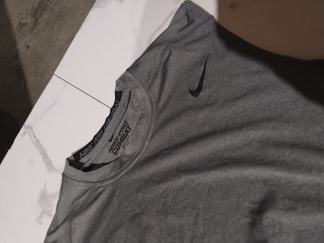 NIKE PRO COMBAT women's (Category: Others Tops) located in Iloilo. Submitted by raydelcanomay (Listing ID 1463784175, Image 2). Description: NIKE PRO COMBAT DRI FIT WOMEN'S Size - XL ON TAG Dimes - W13 L27 Colorate - 9.8 Condition - EXCELLENT Tags - COMPLETE Issue - MINOR HAIRLINES SA NIKE PRINT Price - 250.