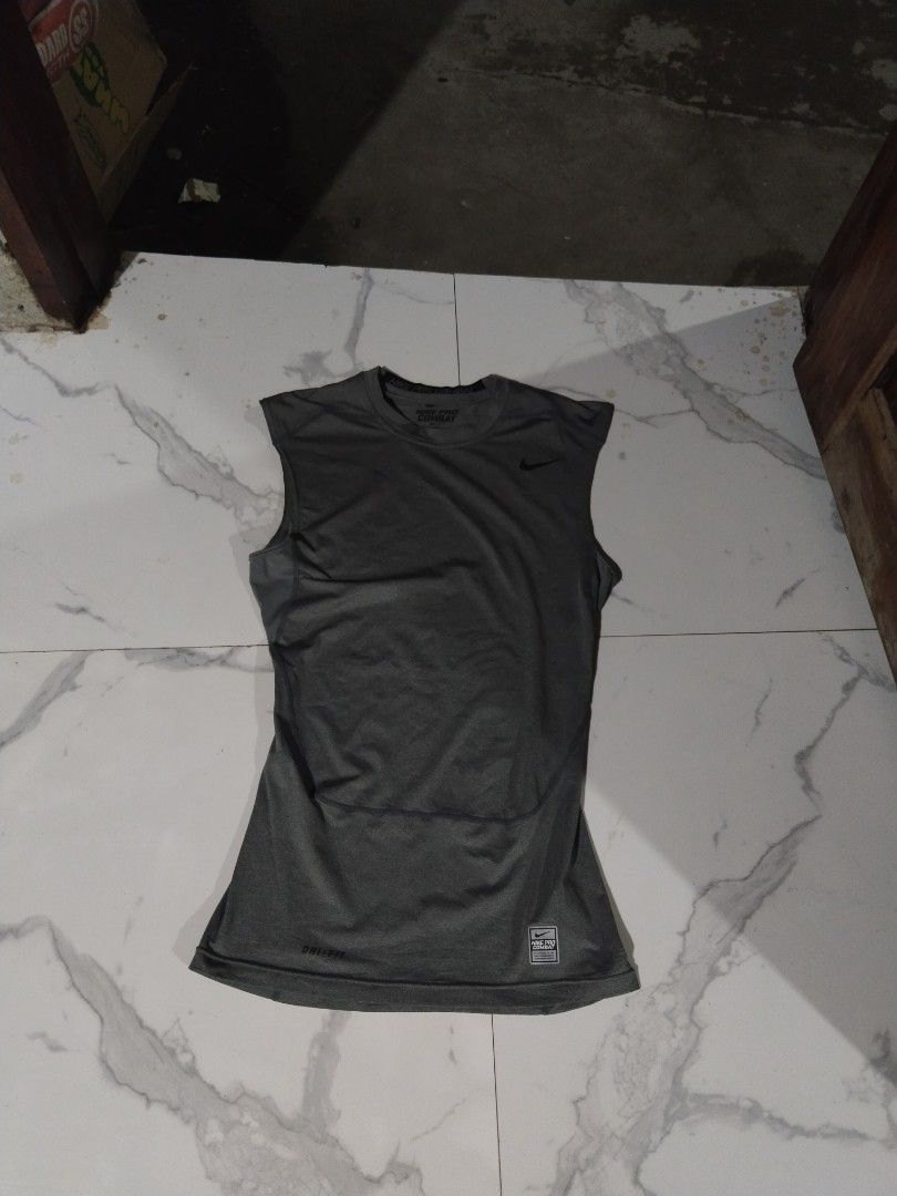 NIKE PRO COMBAT women's (Category: Others Tops) located in Iloilo. Submitted by raydelcanomay (Listing ID 1463784175, Image 1). Description: NIKE PRO COMBAT DRI FIT WOMEN'S Size - XL ON TAG Dimes - W13 L27 Colorate - 9.8 Condition - EXCELLENT Tags - COMPLETE Issue - MINOR HAIRLINES SA NIKE PRINT Price - 250.