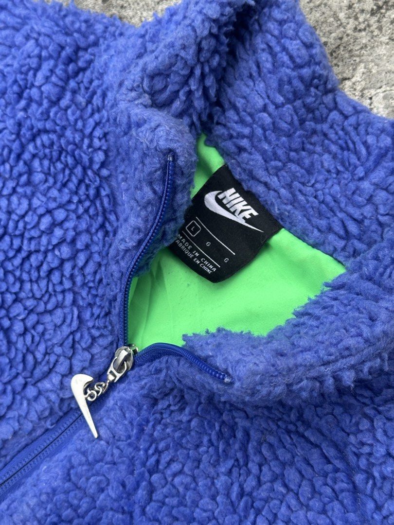 Nike purple Fleece Zip Up Jacket (Category: Coats, Jackets and Outerwear) located in Bago City. Submitted by thekasproject (Listing ID 1463823700, Image 3). Description: - Super cozy purple fleece jacket from Nike - Bright green lining - Small embroidered Nike swoosh on chest - Larger embroidered swoosh on back - Full zip closure with Nike branded zipper pull - Great for layering or wearing on its own.