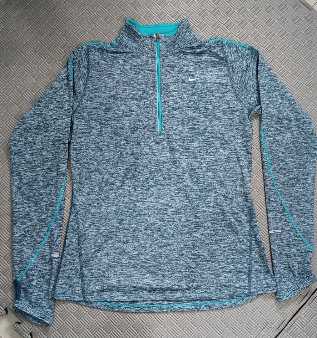 Nike Running Dri-Fit 1/4 Zip (Category: Activewear) located in Bulacan. Submitted by jasonofalltrades_ (Listing ID 1463801415, Image 3). Description: Nike Running Dri-Fit 1/4 Zip Pullover Thumbholes Long Sleeve Womens M.