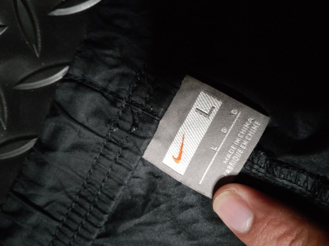 Nike Vintage 2007 Nylon Track Pants (Category: Activewear) located in Baguio. Submitted by bado.feels (Listing ID 1463874805, Image 3). Description: Color: Black Color rate: 9/10 Size 38 Length 38 Thigh 12 Leg opening 10 550+sf Baguio loc.