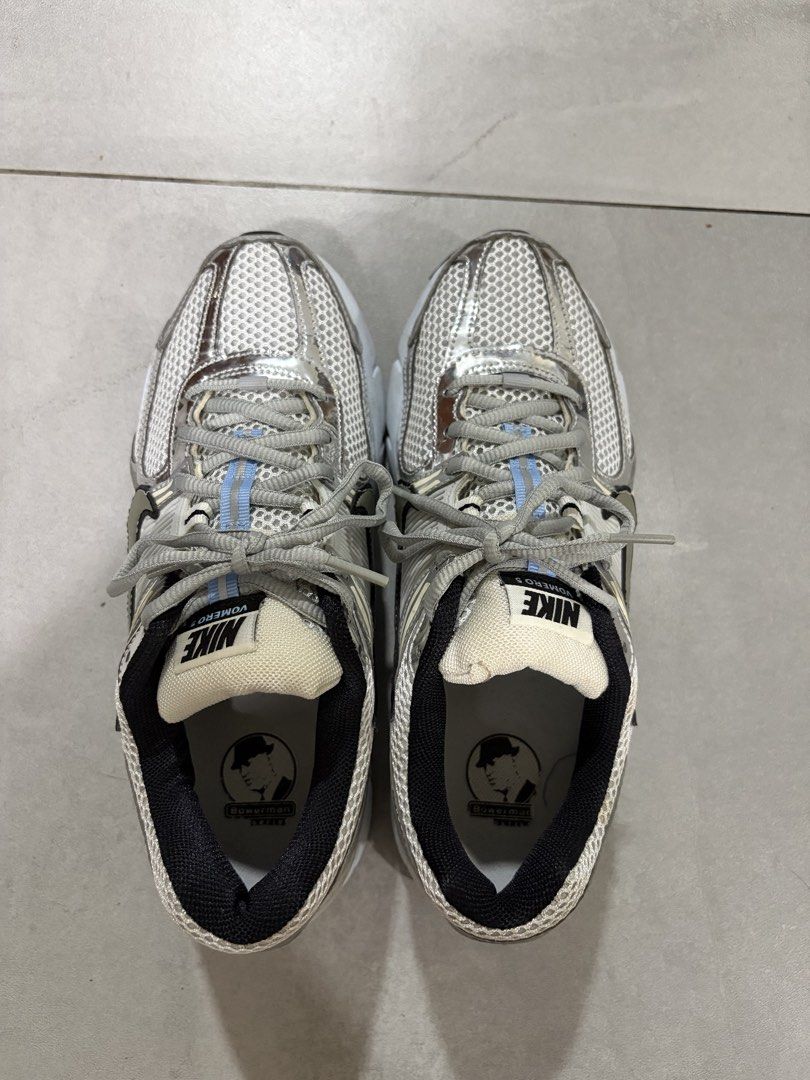 Nike Vomero 5 (US8.5) (Category: Sneakers) located in Quezon City. Submitted by ewyeung (Listing ID 1463844665, Image 3). Description: - Nike Vomero 5 - Colorway: Silver and White with Light Blue accents - Bought from Nike app Nov 2024, original - Versatile: Perfect for running or casual wear - Condition: Good, used only 2 times. Please check photos for detailed condition..
