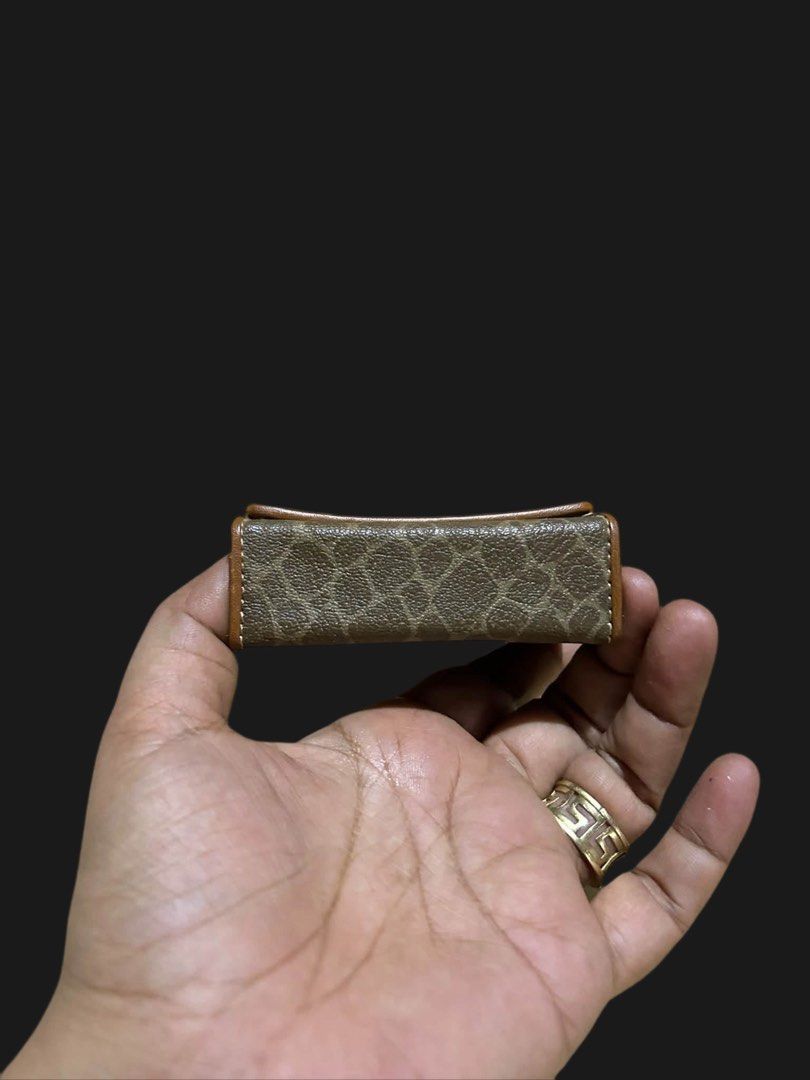NINA RICCI Cigarette Pouch/Case Leather (Category: Luxury Bags & Wallets) located in Cabanatuan. Submitted by jennietomodachi (Listing ID 1463912972, Image 3). Description: vintage Nina Ricci small snap wallet or cigarette/card case featuring a brown and tan patterned design with an embossed “NR” logo on the front leather strap..