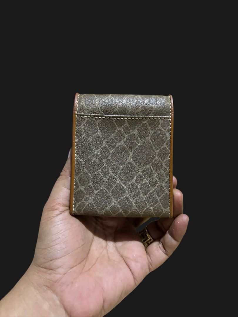 NINA RICCI Cigarette Pouch/Case Leather (Category: Luxury Bags & Wallets) located in Cabanatuan. Submitted by jennietomodachi (Listing ID 1463912972, Image 2). Description: vintage Nina Ricci small snap wallet or cigarette/card case featuring a brown and tan patterned design with an embossed “NR” logo on the front leather strap..