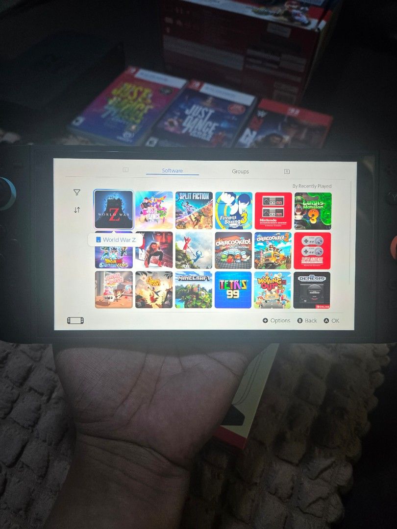 Nintendo switch 2 with games (Category: Nintendo) located in San Juan City. Submitted by lukapukus (Listing ID 1463768290, Image 2). Description: For sale lang po pass sa swap Selling nintendo switch 2 with games and complete accessories No issue tempered glass install day one smooth na smooth Box Dock Charger Hdmi cable(Rep) Joycon grip Strap Free case pouch and charging dock Games nasa account po lahat ng games can change email and password upo