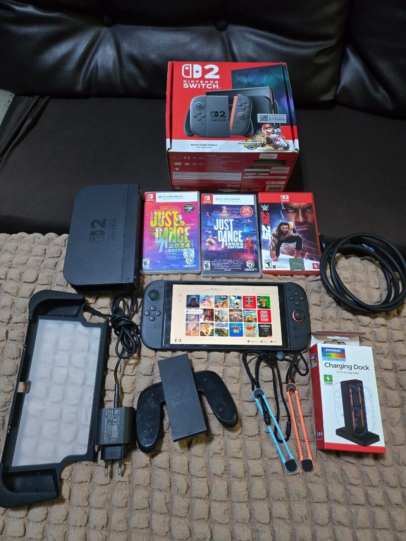 Nintendo switch 2 with games (Category: Nintendo) located in San Juan City. Submitted by lukapukus (Listing ID 1463768290, Image 1). Description: For sale lang po pass sa swap Selling nintendo switch 2 with games and complete accessories No issue tempered glass install day one smooth na smooth Box Dock Charger Hdmi cable(Rep) Joycon grip Strap Free case pouch and charging dock Games nasa account po lahat ng games can change email and password upo