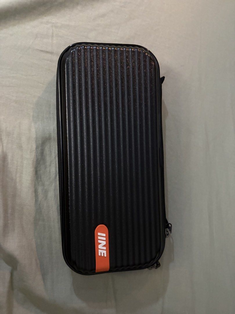Nintendo Switch Lite with Carrying Case (Category: Nintendo) located in Manila. Submitted by sarmientom52880 (Listing ID 1463818632, Image 2). Description: - Nintendo Switch Lite (Grey) - Includes black protective carrying case - Case features mesh pocket for accessories and game slots - Comes with 256GB, SD card, Fornite edition.