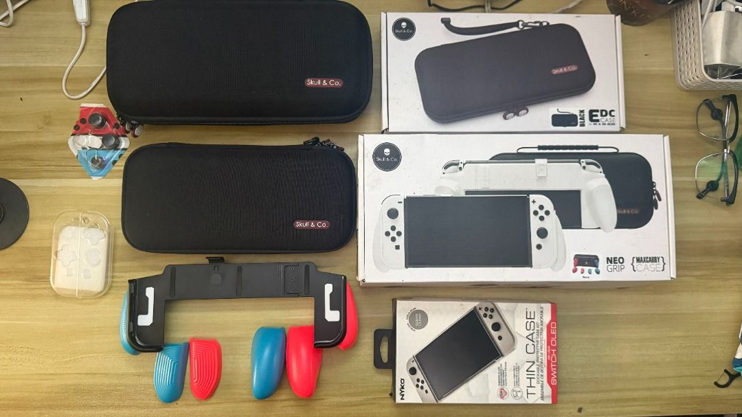 Nintendo Switch OLED with Accessories (Category: Nintendo) located in Pasig City. Submitted by zenforest_1989 (Listing ID 1463787593, Image 2). Description: 🔖 FOR SALE Nintendo Switch Console with Red/Blue Joy-Con (OLED Model) with complete in-box accessories ❌ No Issues Accessories ⭐ Skull & Co. Neo Grip with Maxcarry Case Bundle ⭐ Skull & Co. EDC Case(Unused) ⭐ Skull & Co. Tempered Glass (Unused spare) ⭐ Nyko Thin Case (Unused) ⭐ Dobe Thumbsti